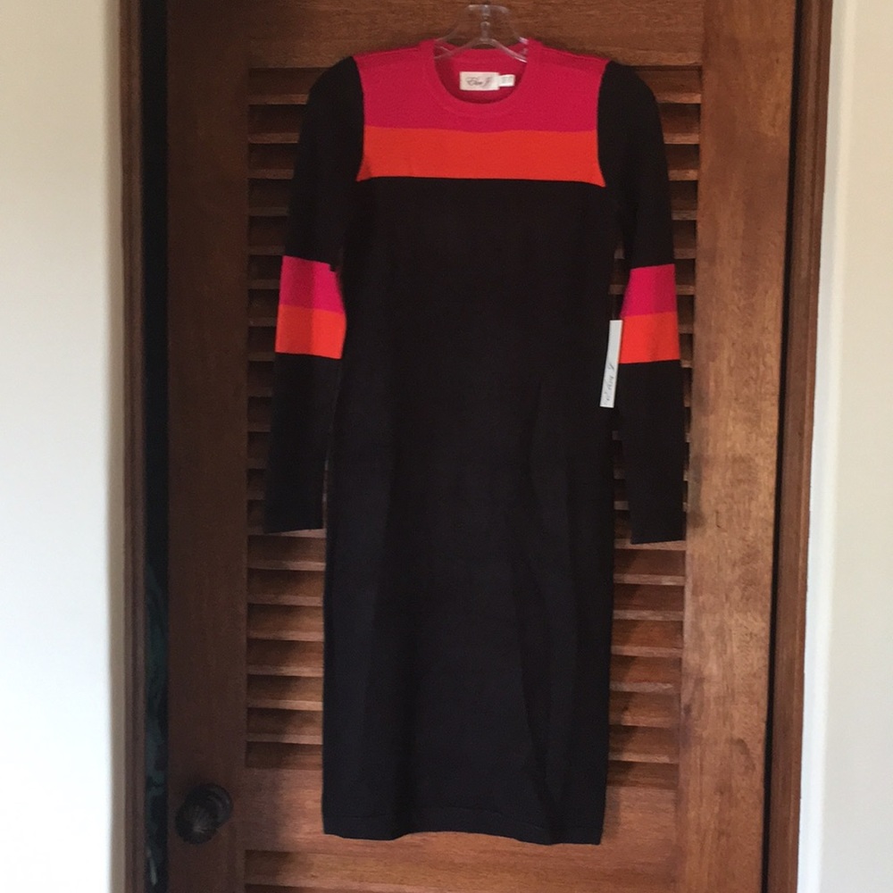 Mid length sweater dress 90% acrylic. Never worn